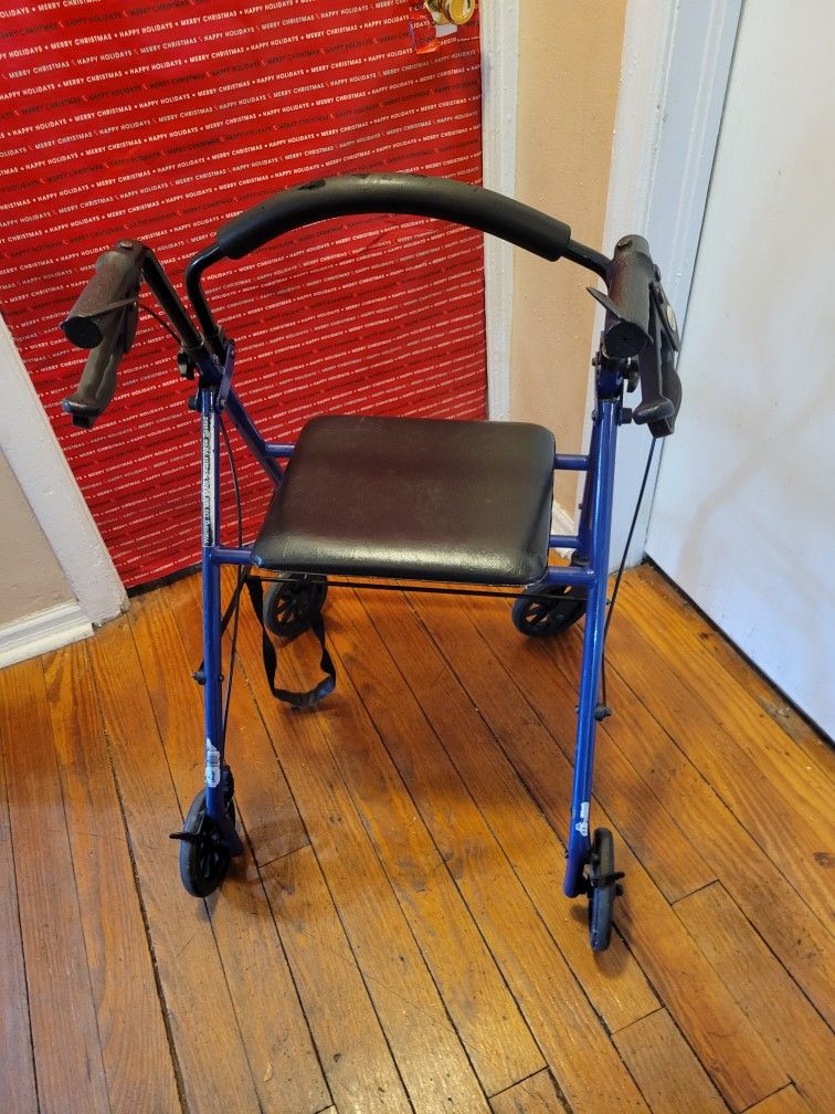 Portable walker with seat