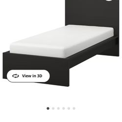 Bedframe with two mattresses, and bed slats