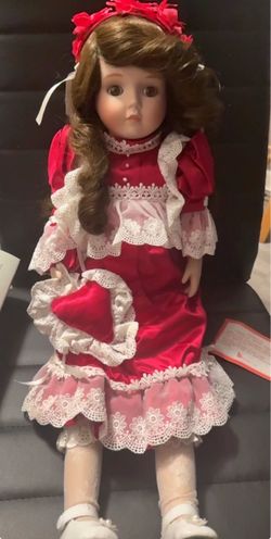 Collectible Porcelain Doll in Red Dress