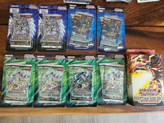 14 Brand new Yugioh booster packs & starter deck