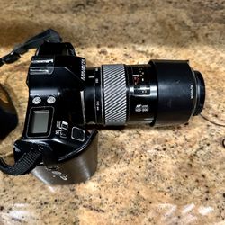 Minolta Maxim 3000i 35mm Film Camera with Strobe Light and Telephoto Lens