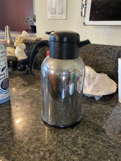 Coffee thermos.