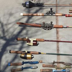 OLD 35 Fishing poles 7 with reels and 5 old pole handles 