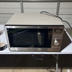 Panasonic NN-SD69LS 1.3 Cu. Ft. 1100W Cooking Power Electromechanical Microwave Controls Turbo Defrost Function Countertop Microwave Oven