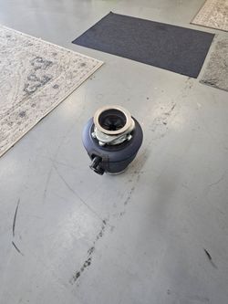 Insinkerator, premier, garbage disposal.
