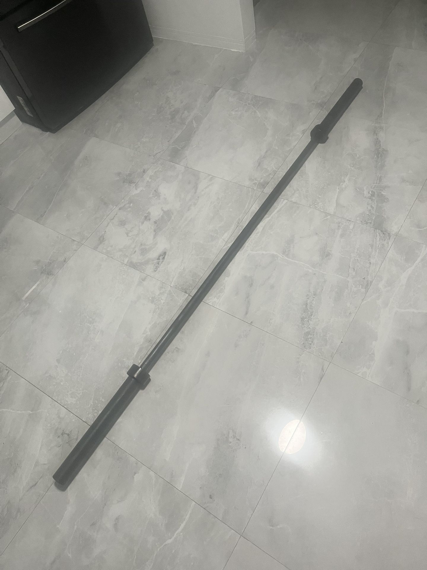 Used 7 foot bar barbell for Olympic weights plates