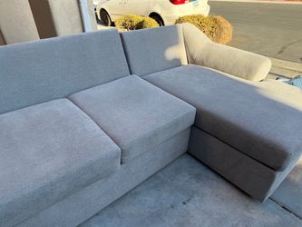 Signature Design by Ashley Sectional with Chaise and Ottoman with matching swivel chair