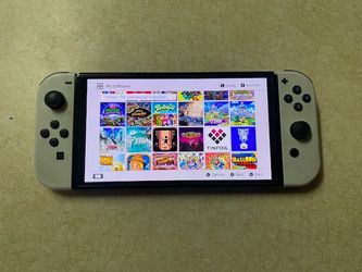 Nintendo Switch OLED with 100 POPULAR SWITCH Games
