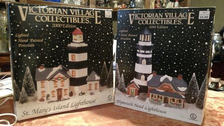 $20.00 for the pair, each are 11" Tall "Victorian Village Lighthouses" 2000 Edition