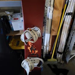 Snow Board With Burton Bindings Snow Pats 2 Pairs of Boots And A Helmet With Snow Jacket And Pants Package Deal