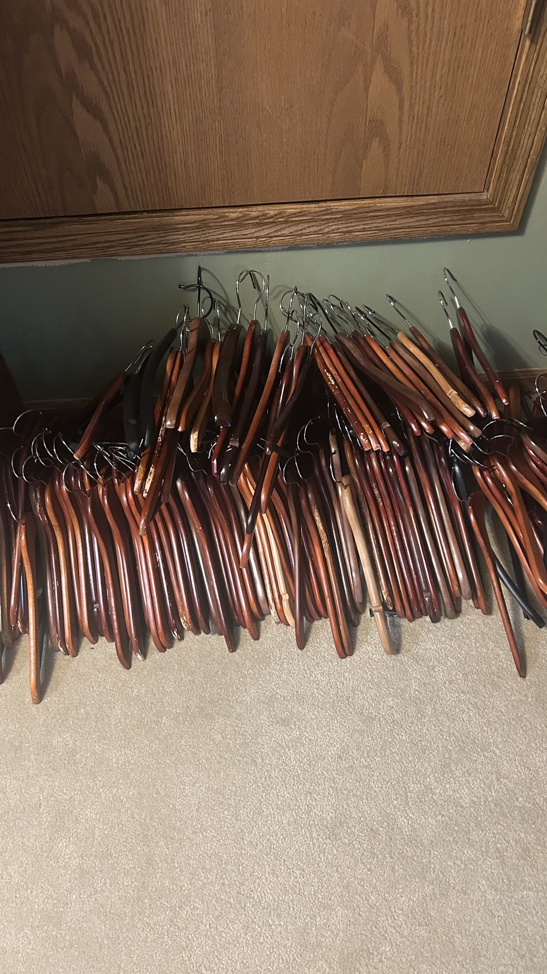 Over 80 wooden hangers