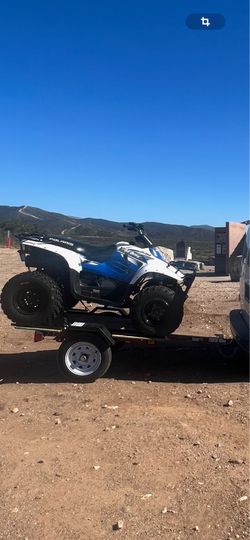 Polaris trail boss 330 w/ trailer automatic