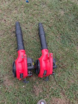 Two Red Gas-Powered Leaf Blowers