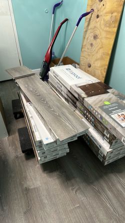 25 boxes of lifeproof Sterling Oak vinyl plank flooring