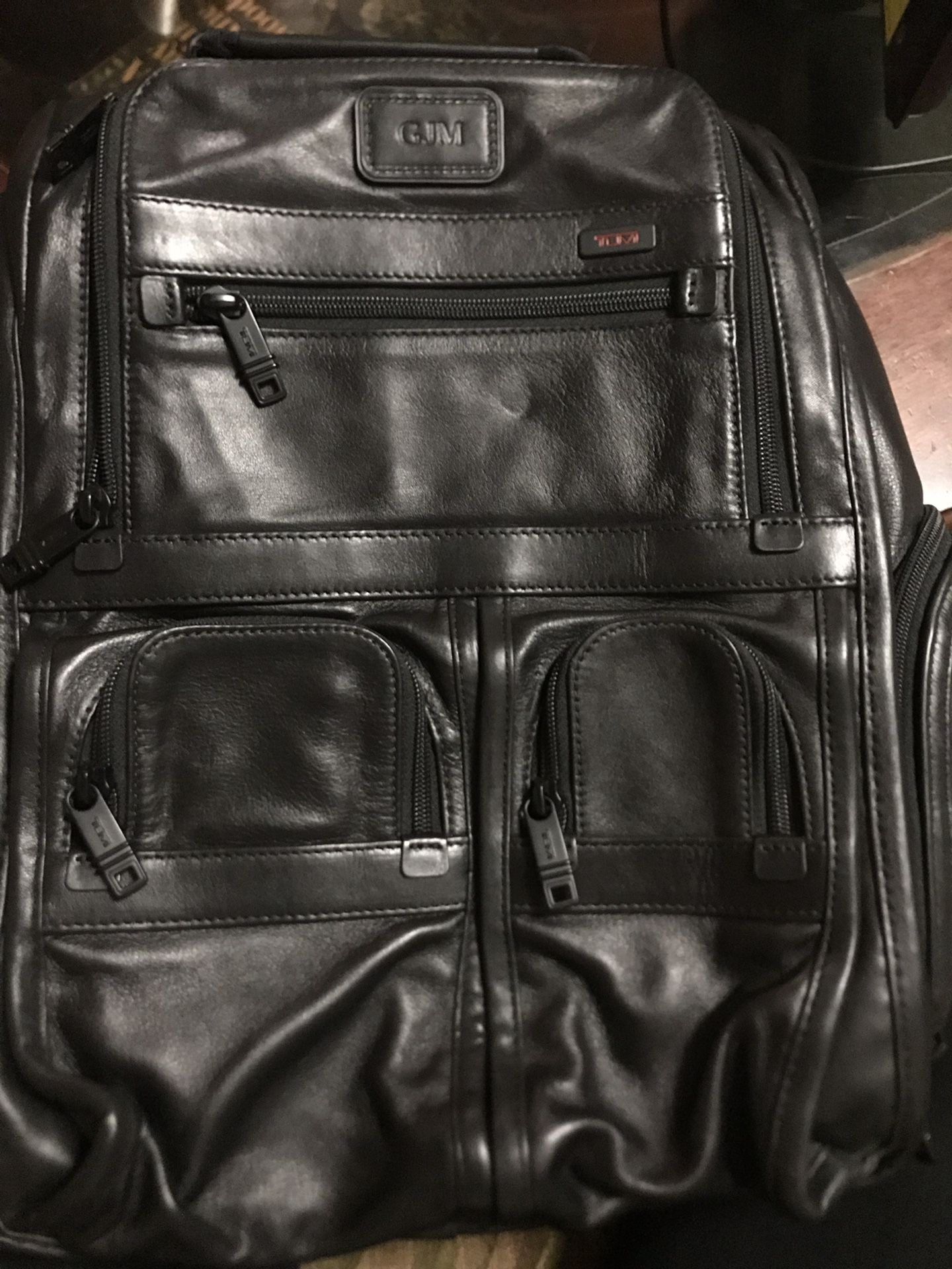 TUMI men’s leather backpack