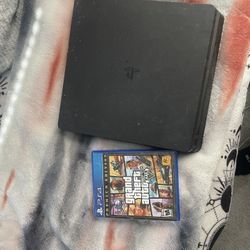 PS4 SLIM WITH GTA5 & BLACK OPS DISC 