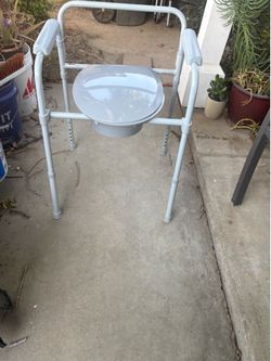 Bedside commode new