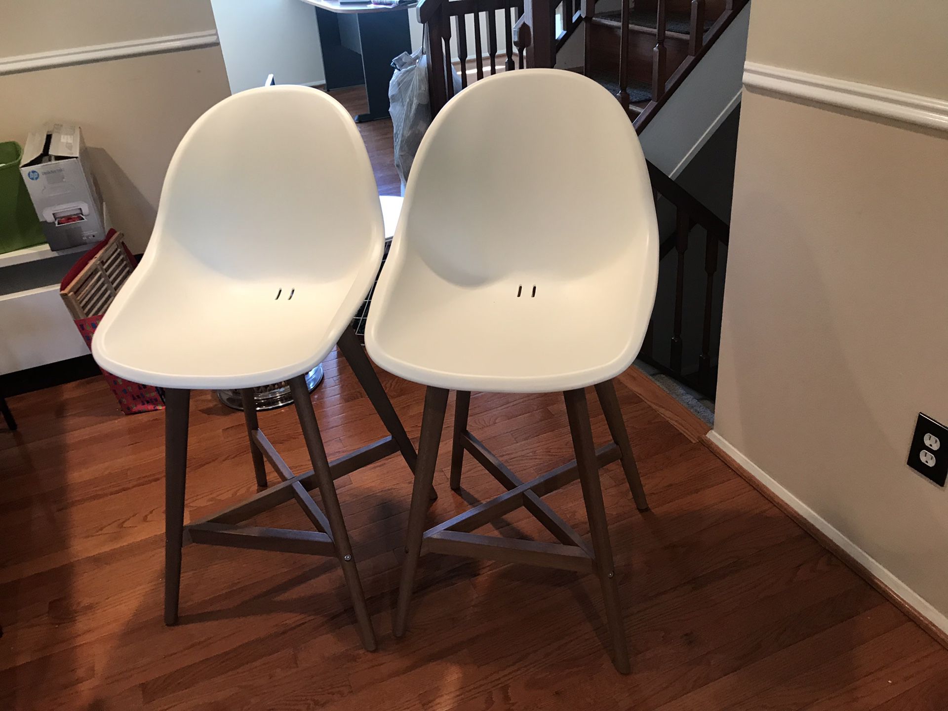 IKEA bar stools and shorter mid century style chairs