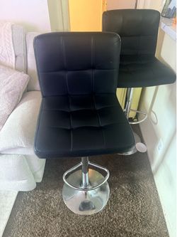 2 Black bar top stools