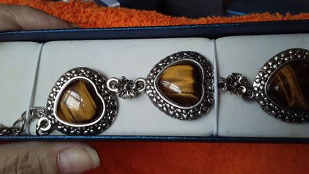 Tiger's Eye bracelet with floral accents.