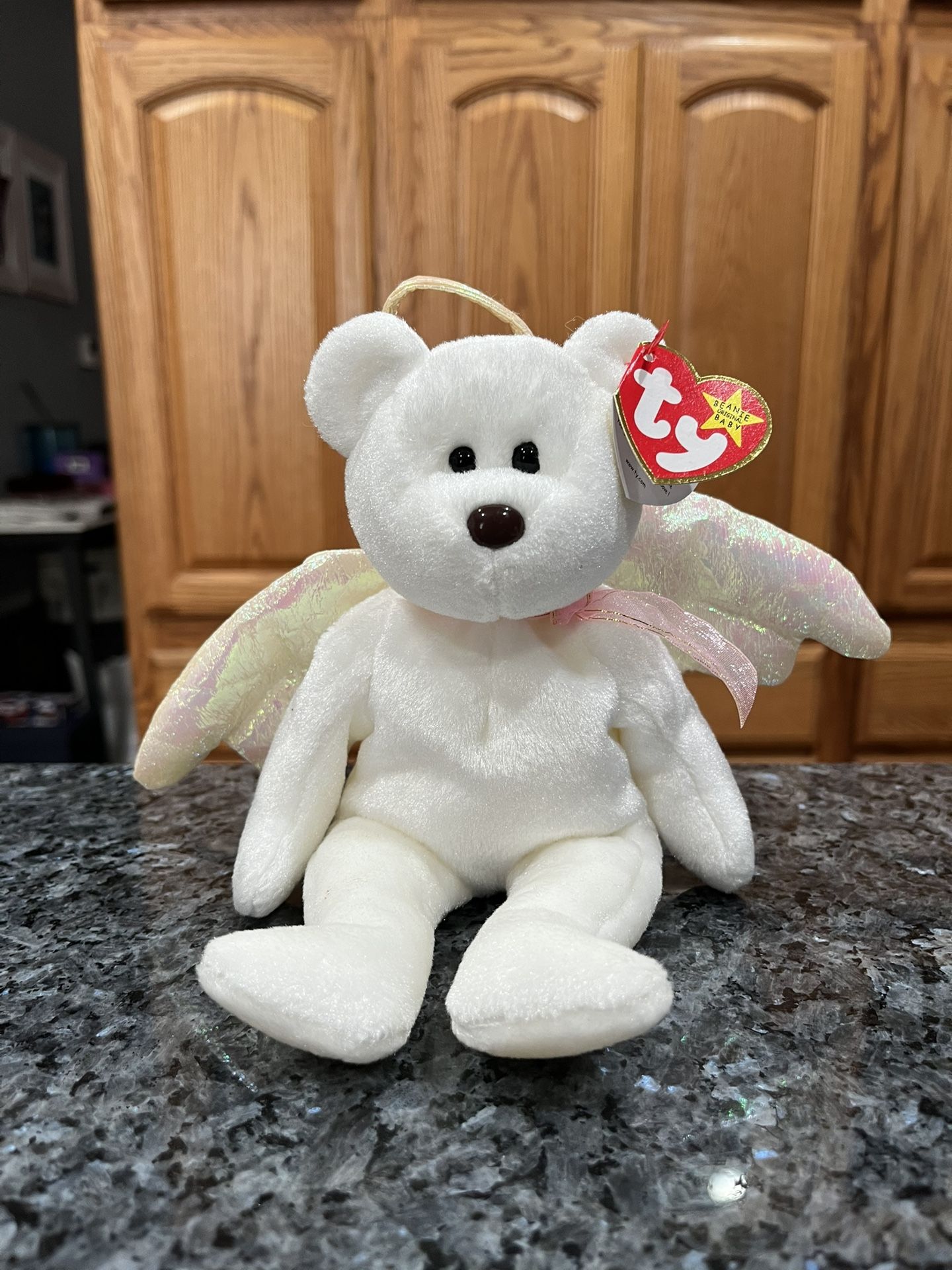 Ty Beanie “Halo” The Bear 1998 Retired Plush Toy. Brand new with tags. Had been on display with a Ty Beanie Babie Collection.