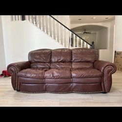 Brown leather couches 