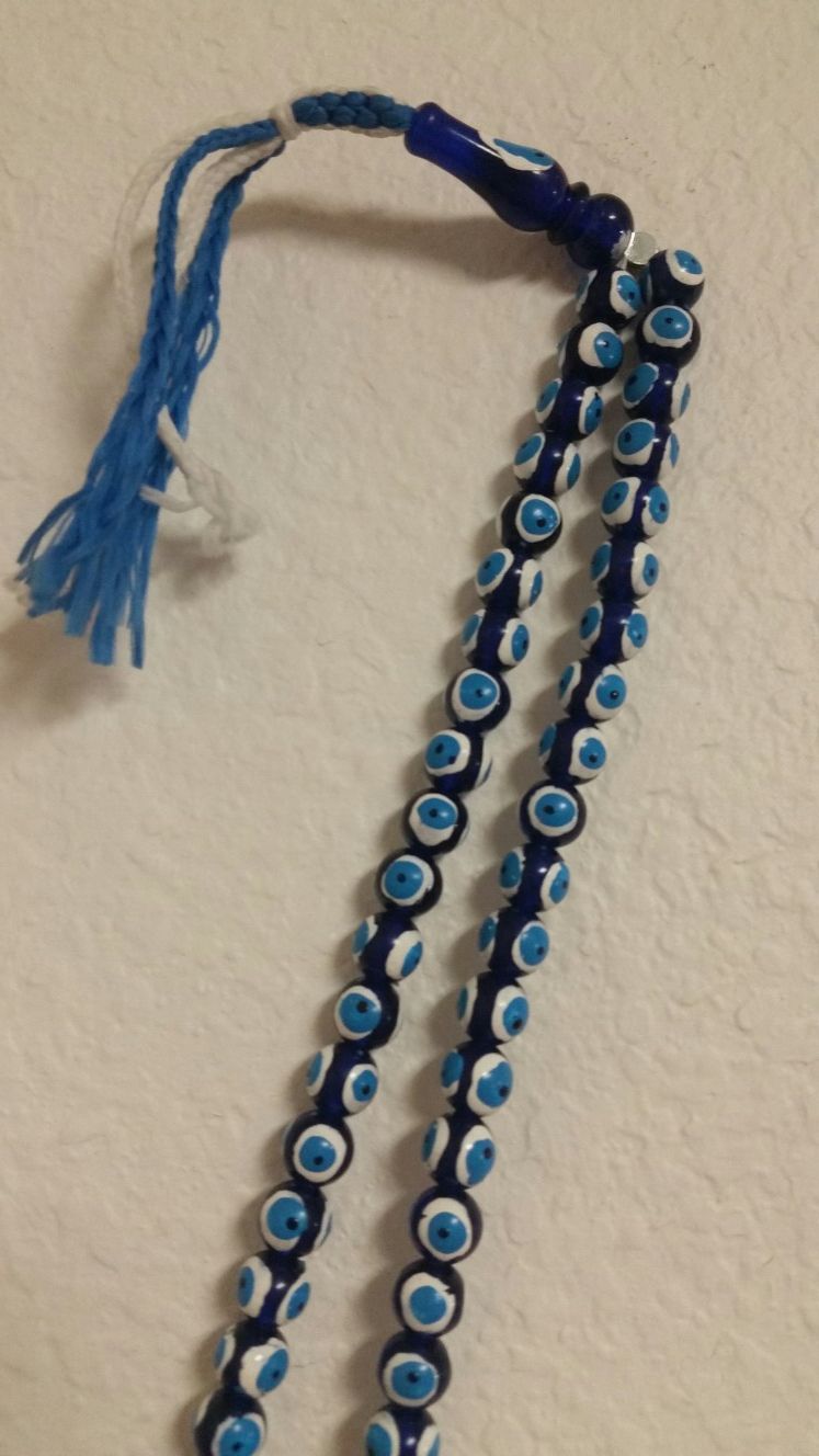 Evil eye wall decor rosary beads new