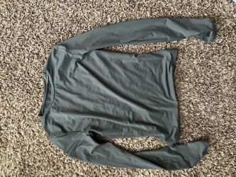 pack of shirts/ sweaters