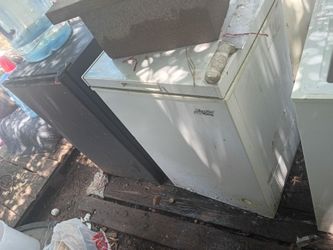Two freezers and mini fridge