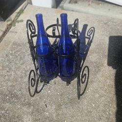 Cast iron wine bottle holder