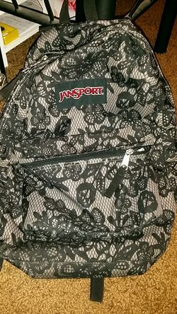 JanSport black floral backpack