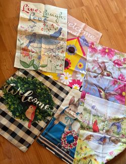 Set of assorted decorative flags for sale.