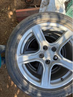 4 - Chevy Camero aluminum rims and Goodyear Eagle tires $100