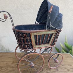 Selling A  doll Buggy , great decorations display, measurements are 27”L and 14”W stands 31”H