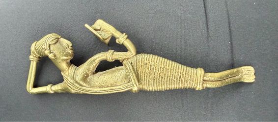 Vintage Handmade Dokra Reading Lady Figurine (Reclining)