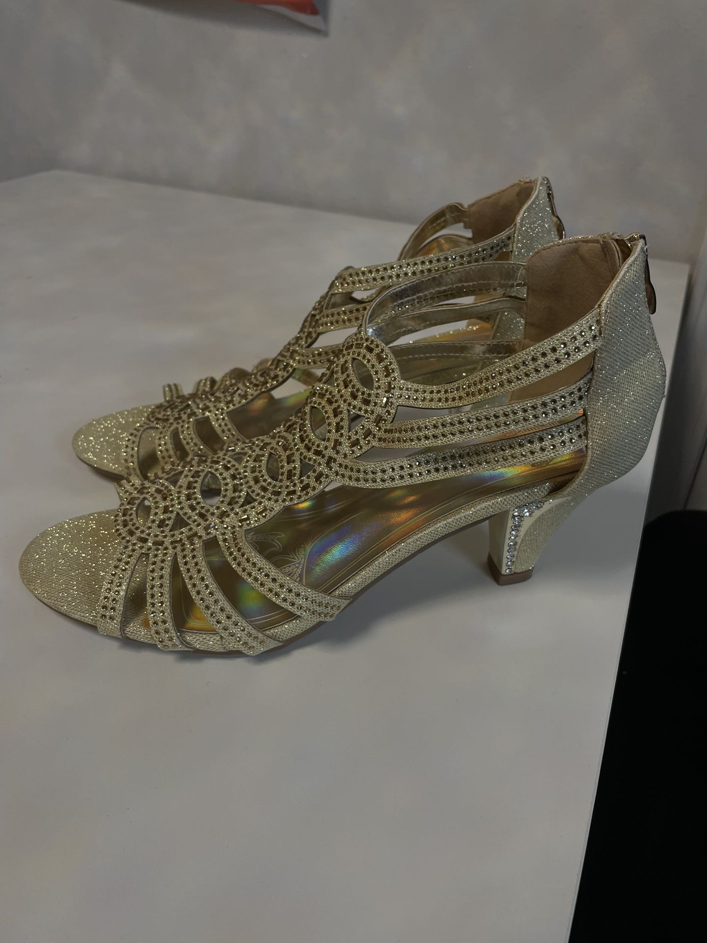 Gold high heels