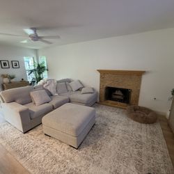 Ashley furniture Sofa + Ottoman Pet friendly Fabric. Originally $1,800. 