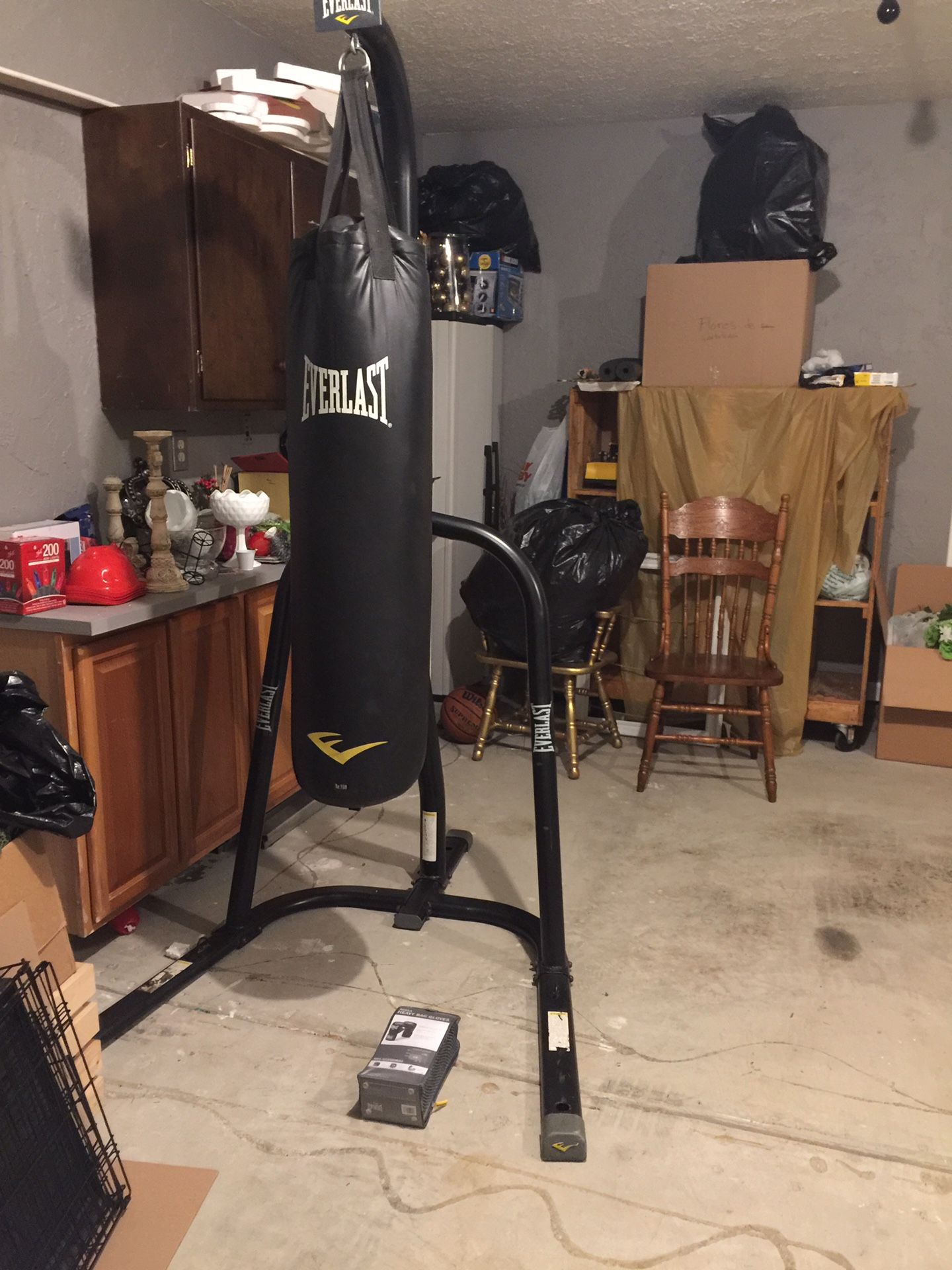 Everlast punching bag with rack, new gloves