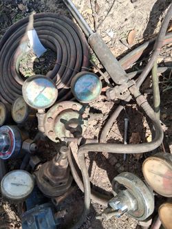 Welding torches regulators hoses and helmet