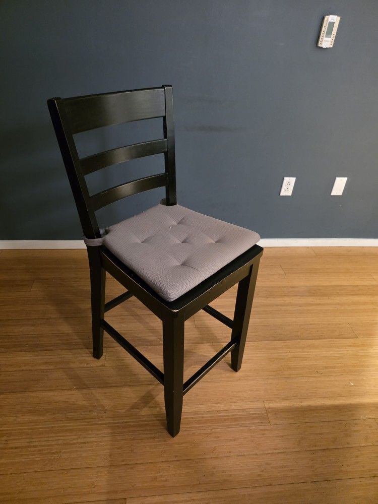 Three (3) Black bar stools with seat cushions