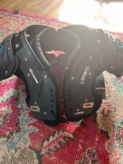 Youth Large brand new shoulder pads