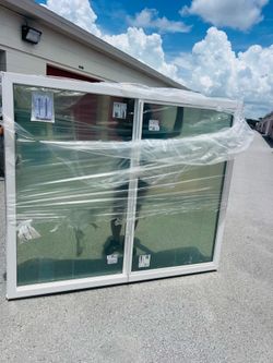 Hurricane Impact Sliding Windows 72x62 each $950