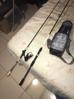 Two Fishing poles and fishing Bag