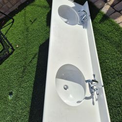 Corian Vanity Top With Delta Faucets And Sinks