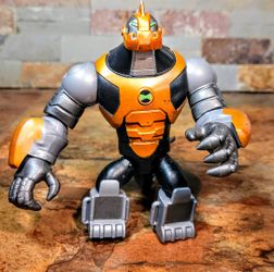 This Is A Ben-10 Omni-Kix Armor Humungouaur Action Figure  • Mfg. By : Playmates Toys • From The Cartoon Series • The Figure Features An Armoured Tail
