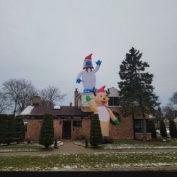 2 extra large Christmas blow up decorations $300 each both for 500.