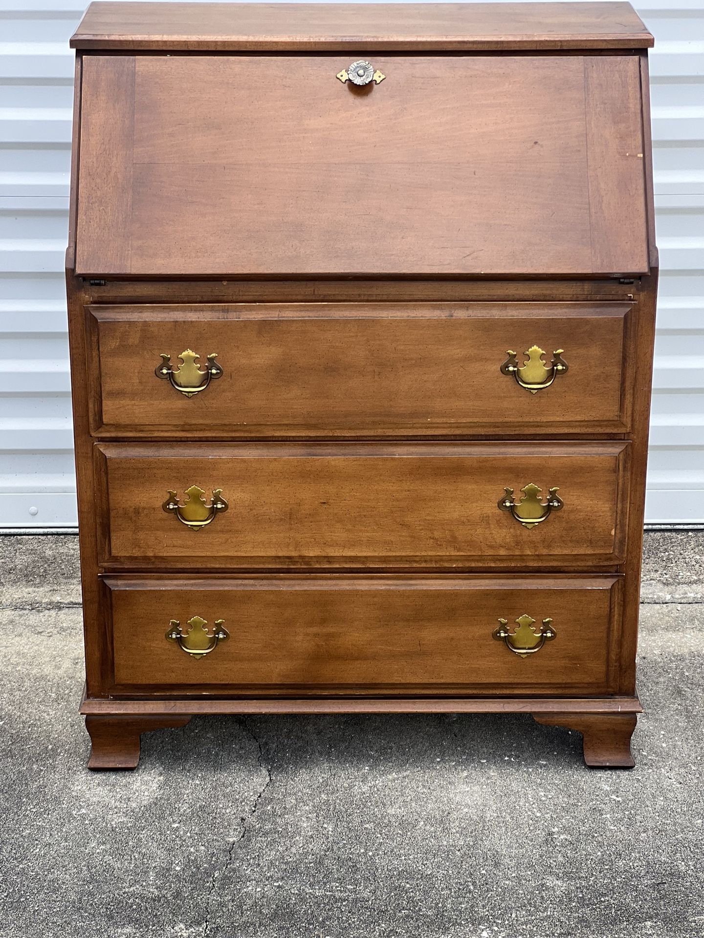 Vintage Gordon’s Solid Slant Front Chippendale Style Drop Front Secretary Desk. Used in good condition with small minor cosmetic blemishes. These blem