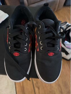Boys Heelys size 4
