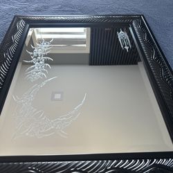 Engraved mirror