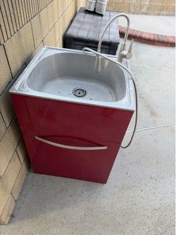 Outdoor sink with faucet, almost new.